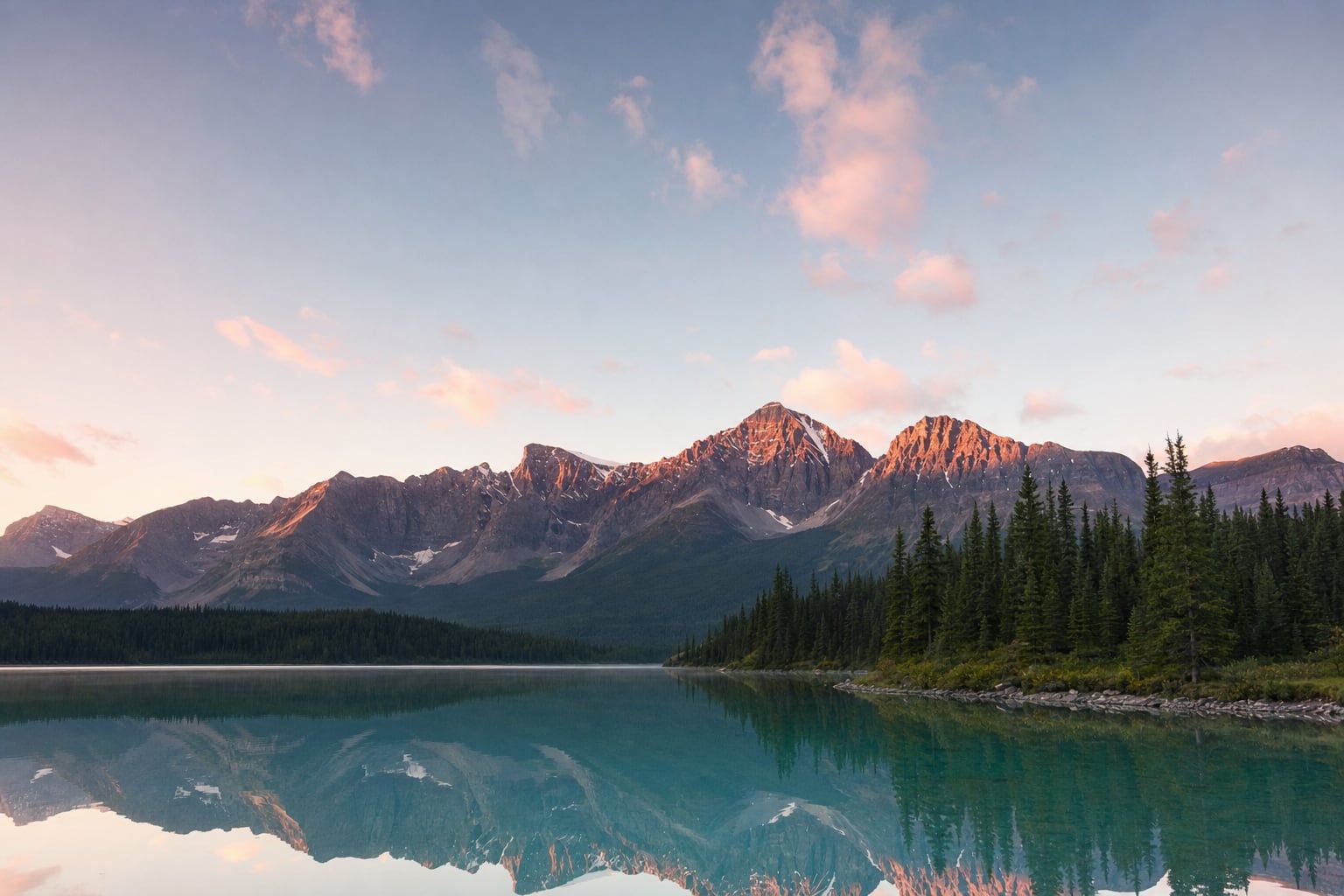 Sunrise at Moraine Lake, Banff Sunrise lighting the Ten Peaks above the turquoise water of Moraine Lake