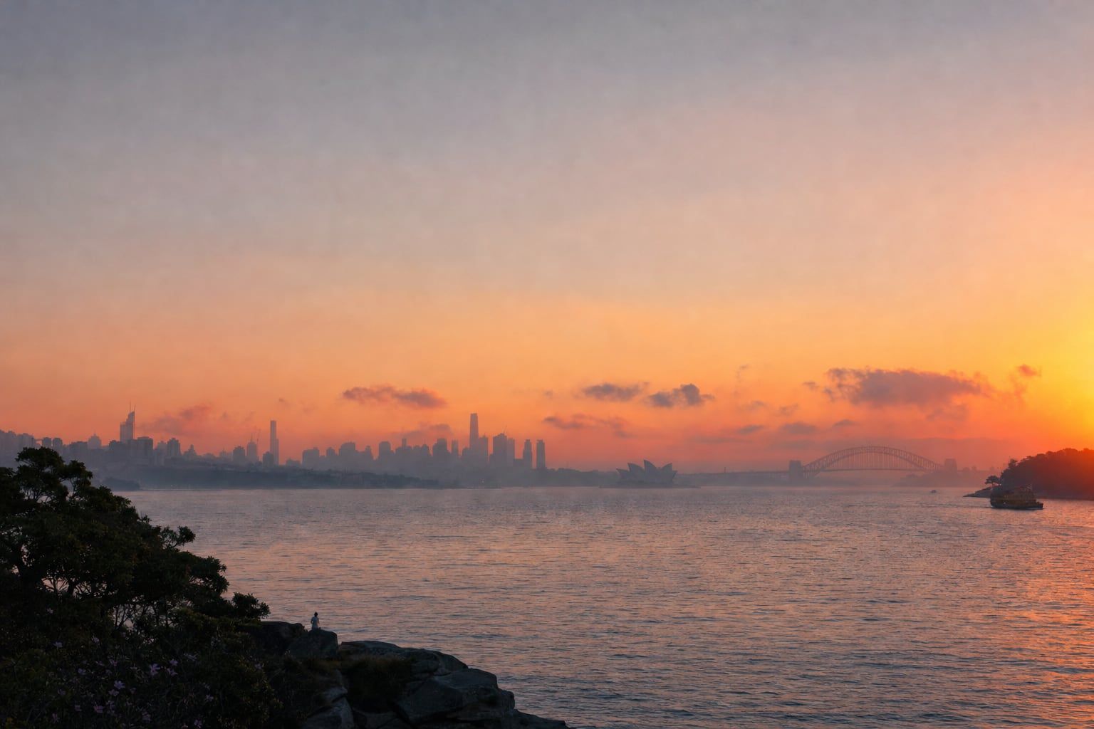 Sunrise over Sydney Harbour Sunrise over Sydney Harbour with the Opera House in the distance